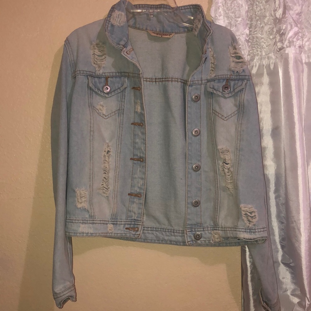 Distressed denim jacket